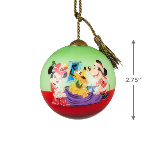 Colorful Christmas ornament with cartoon characters on a white background