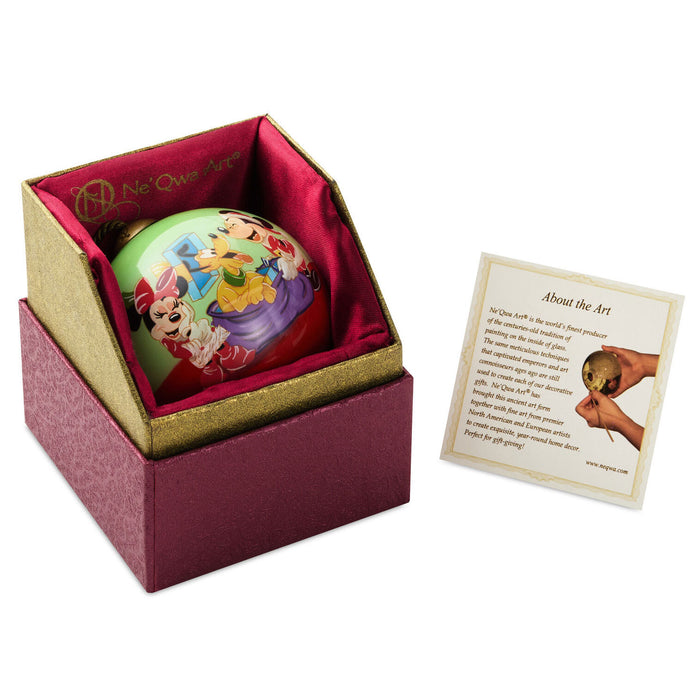 Decorative ornament in a box with a card on a white background