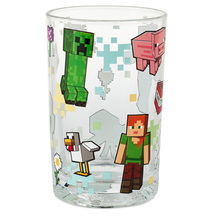 Clear glass tumbler with Minecraft character illustrations on a white background