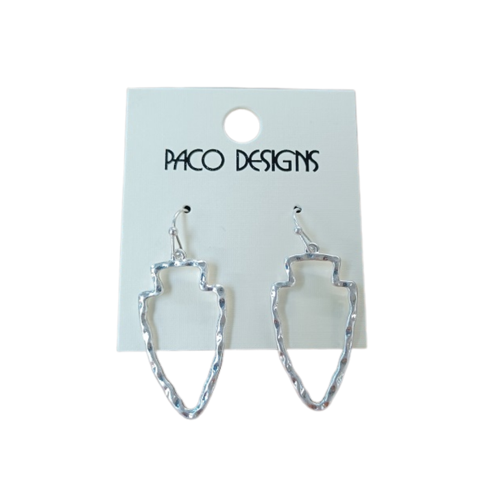 Silver arrowhead-shaped earrings on a Paco Designs card against a white background