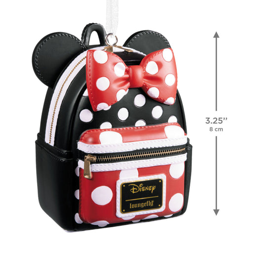 Backpack with polka dot design and bow, featuring Disney branding, with dimensions indicated.