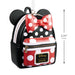 Backpack with polka dot design and bow, featuring Disney branding, with dimensions indicated.