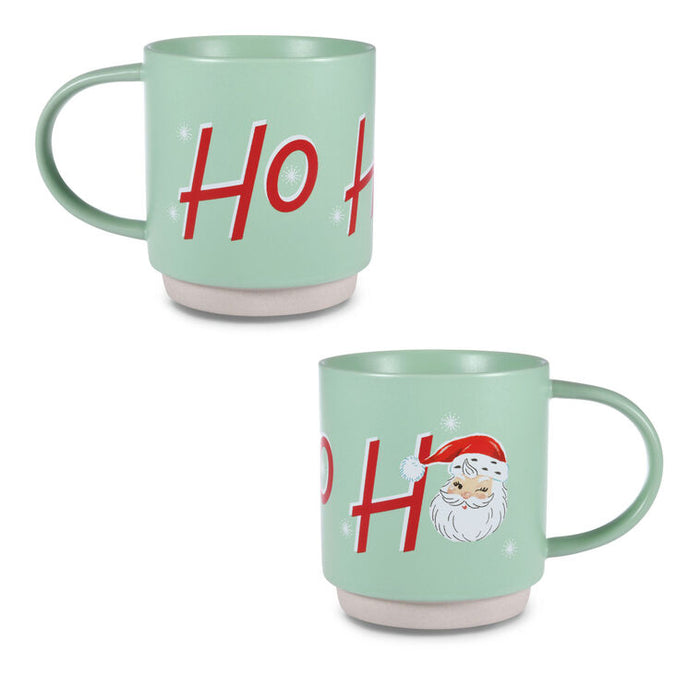 Two green mugs with 'Ho Ho Ho' text and Santa Claus design on a white background