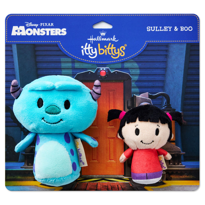 Two 'Itty Bittys' plush toys, Sulley and Boo, from Disney Pixar Monsters Inc. in their packaging.
