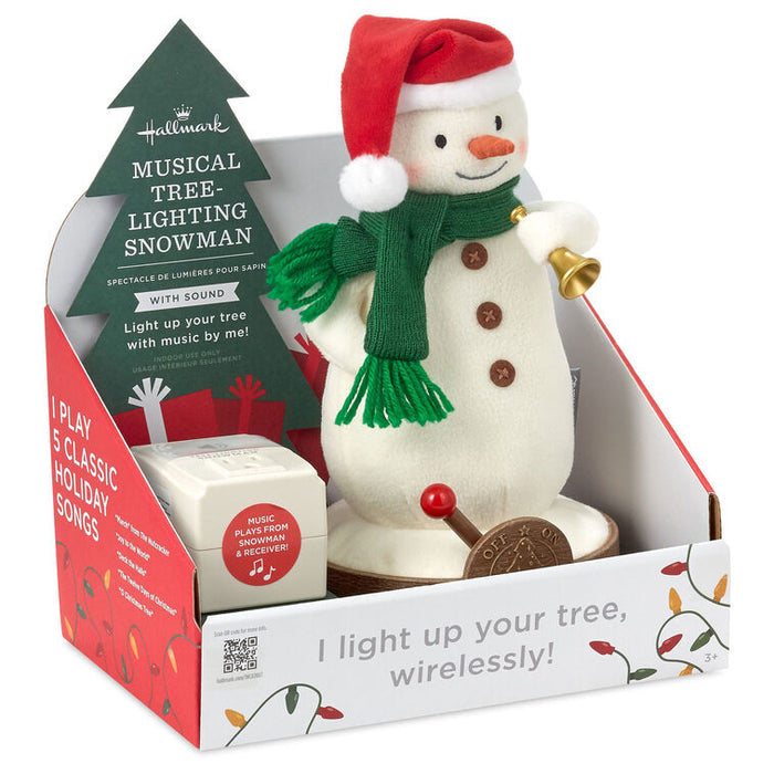 Musical tree-lighting snowman in packaging with Christmas tree design