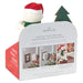 Christmas-themed product with a stuffed animal wearing a Santa hat and a tree-shaped packaging box featuring Hallmark branding.