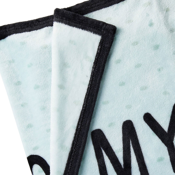 Close-up of a product with text on a textured surface