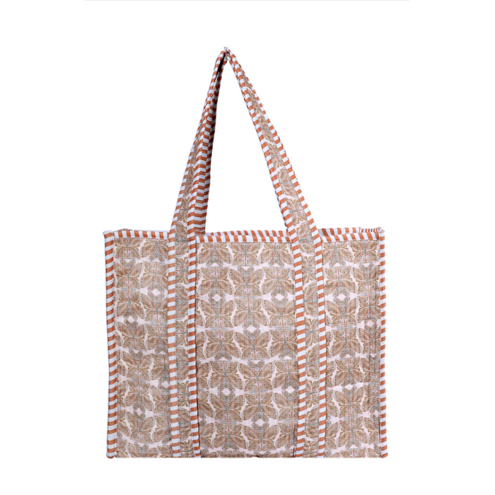 A canvas tote bag with a beige and white floral pattern and orange-red striped borders and handles, shown against a plain white background.