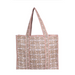A canvas tote bag with a beige and white floral pattern and orange-red striped borders and handles, shown against a plain white background.