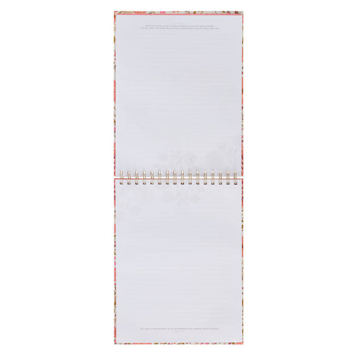 Two spiral-bound notepads with floral edge design on a white background