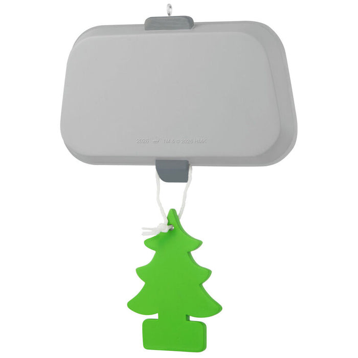 Car air freshener shaped like a green tree hanging from a gray holder on a white background