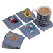 Collection of retro game cartridges and a mug with a game design on a white background