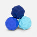 Three geometric-shaped blue and light blue rubber balls on a white background