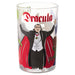 A clear drinking glass featuring a printed Dracula illustration with his arms raised, red cape, black suit, white shirt, and the word 'Dracula' in red at the top, shown on a plain white background.