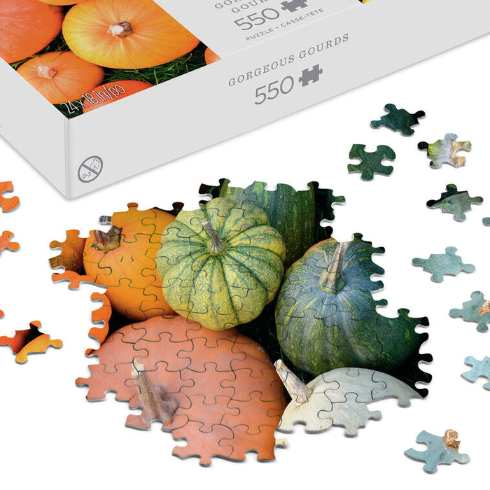Gorgeous Gourds puzzle with pieces scattered on a white background