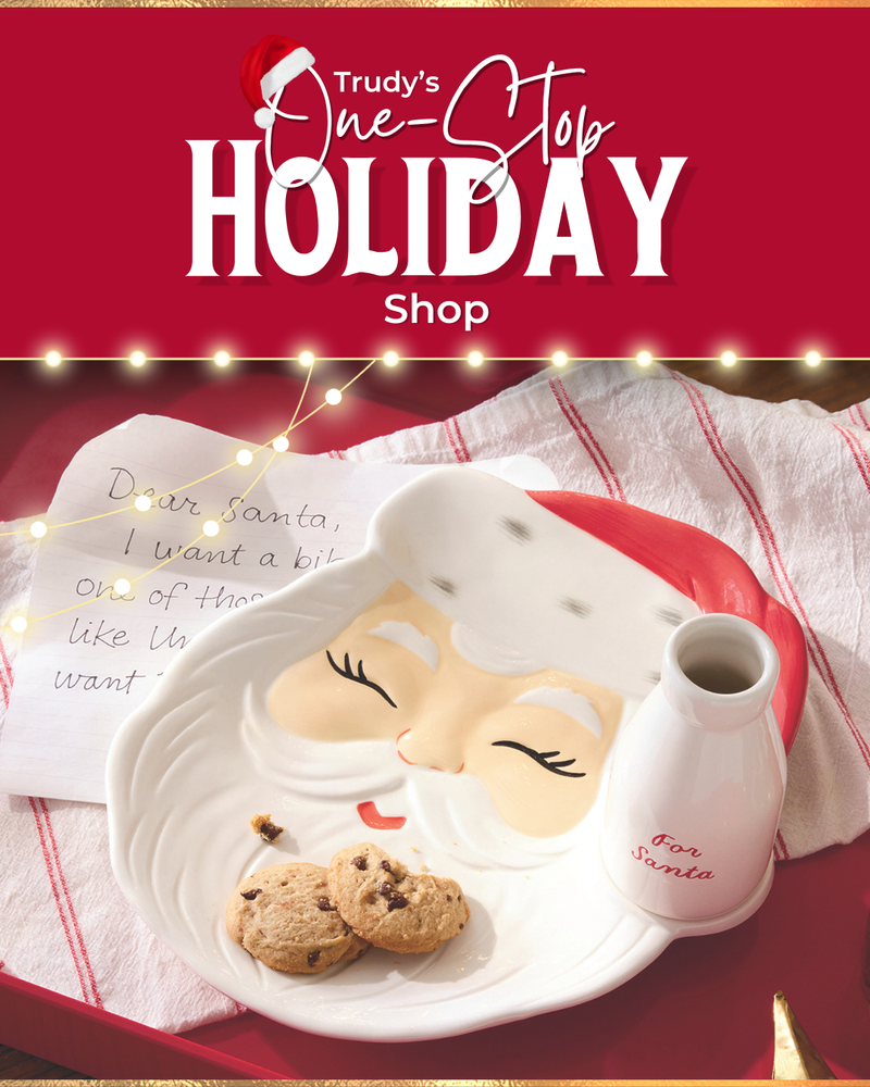 Product display with Santa-themed plates and cookies on a red background, featuring 'Trudy's One-Stop Holiday Shop' text.