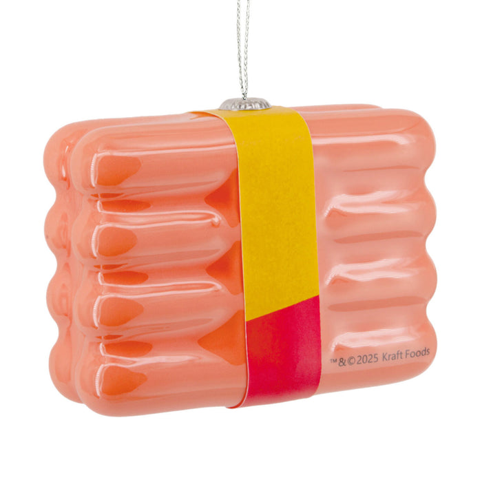 Pink and orange striped candy with a yellow band on a white background