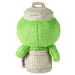 Green plush toy with a white container on a white background