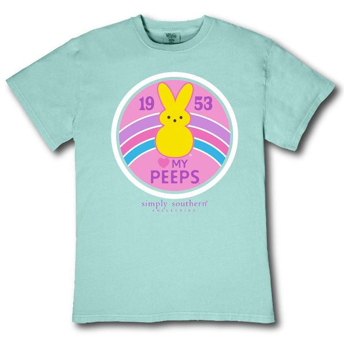 Light blue t-shirt with a graphic of a yellow chick and text on a white background