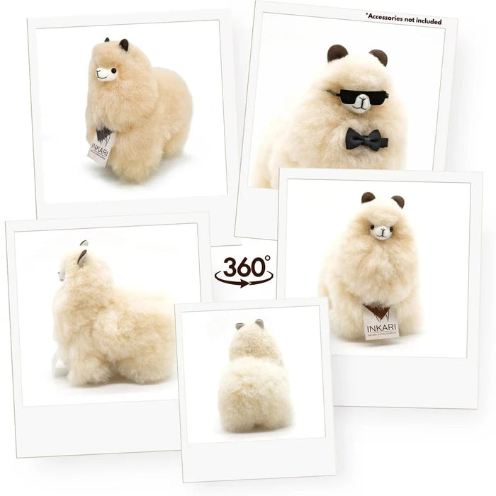 Plush toy llama with a visible Inkari tag on a white background