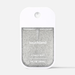 Sparkly Touchland hand sanitizer on a white background