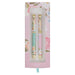 Floral pen set with gold accents in a decorative box on a white background