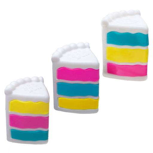 Set of three colorful milk carton-shaped items on a white background