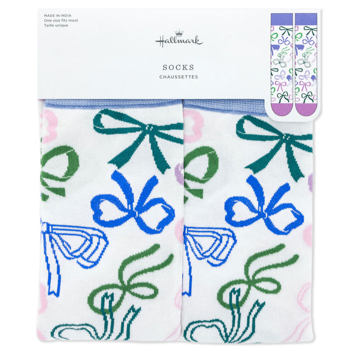 Pair of socks with bow design in packaging, featuring the Hallmark brand.