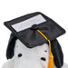 Plush dog toy wearing a graduation cap with a card inside on a white background