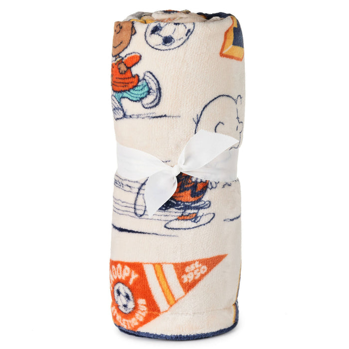 Rolled-up blanket with cartoon character design on a white background