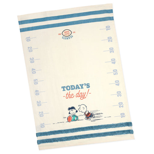 Kitchen towel with cartoon design and text on a white background