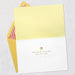 Greeting card with yellow envelope on a light gray background