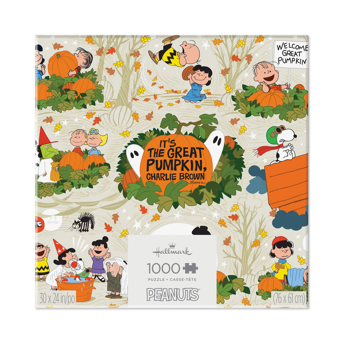 Hallmark 1000-piece Peanuts 'It's the Great Pumpkin, Charlie Brown' jigsaw puzzle box, featuring festive autumn illustrations of characters in costumes on a cream background.