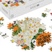 A 1000-piece jigsaw puzzle featuring Peanuts characters in a fall-themed scene, shown with its white box and several loose puzzle pieces on a white background.
