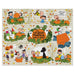 A completed jigsaw puzzle featuring Peanuts characters around pumpkins and autumn scenes, with the central text 'IT'S THE GREAT PUMPKIN, CHARLIE BROWN.' The puzzle fills most of the frame on a white background.