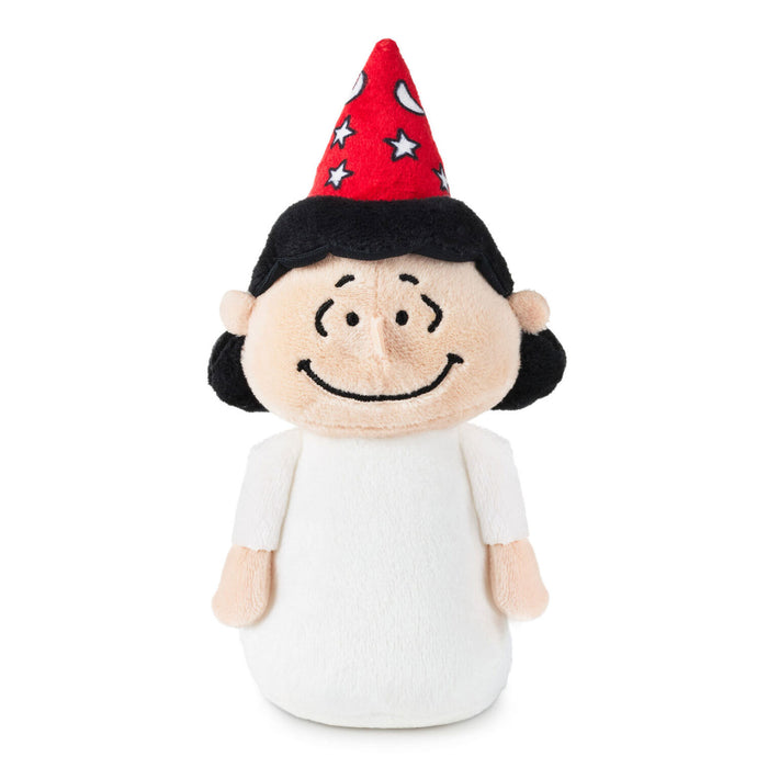 A plush toy figure of a cartoon girl with black hair, a red party hat with white stars and crescent moon, and a white dress, photographed on a solid white background.