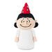 A plush toy figure of a cartoon girl with black hair, a red party hat with white stars and crescent moon, and a white dress, photographed on a solid white background.
