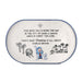 Decorative plate with Christmas-themed design featuring Charlie Brown and Snoopy, with text about Christmas and the birth of Christ.