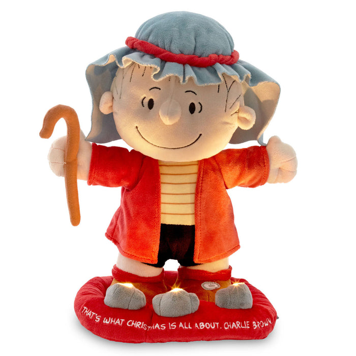 Plush toy resembling a character from a classic cartoon, wearing a red coat and gray hat, holding a cane.
