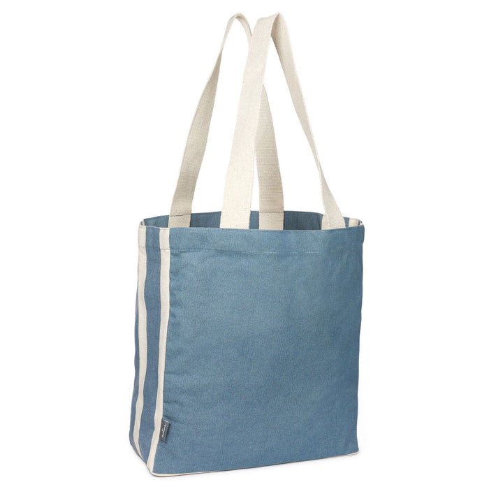 Blue tote bag with white handles on a white background