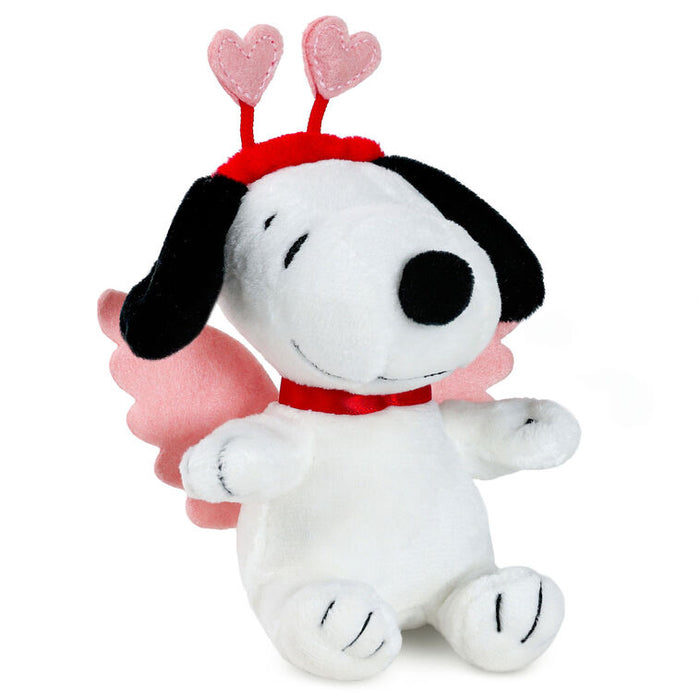 Plush toy of a dog with heart-shaped antlers and a pink bow on a white background