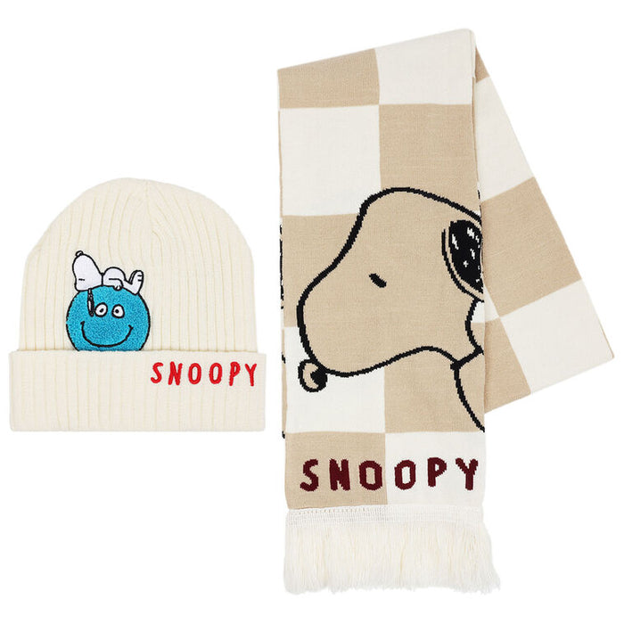 Snoopy-themed beanie and scarf set on a white background