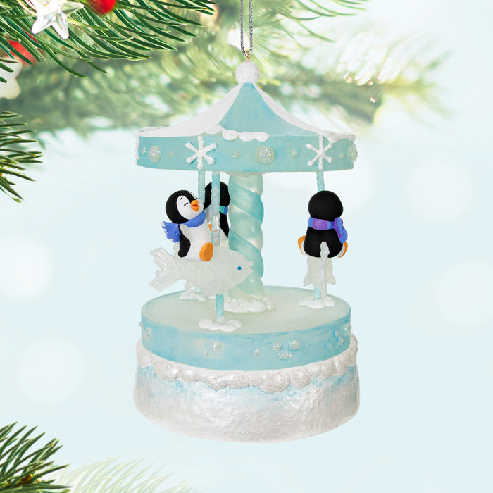 Playful Penguins on Carousel 2024 Musical Ornament With Light and Motion