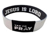 Wristband with 'Jesus is Lord' text on a white background