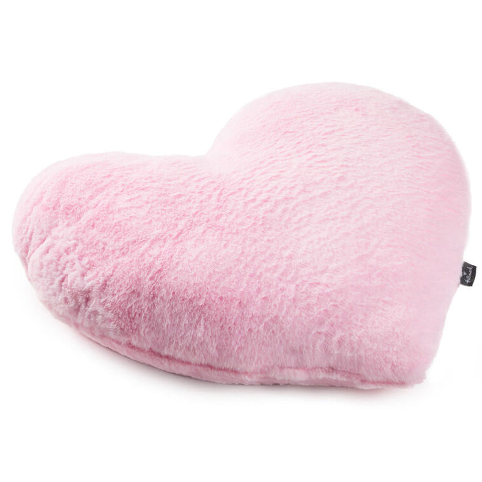 Heart-shaped pink pillow on a white background