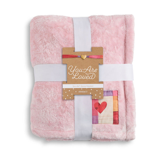 Pink plush blanket with a 'You Are Loved' tag on a white background