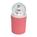 Decorative snow globe with a snowman on a pink base against a white background