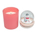 Pink candle and snow globe with a snowman inside on a white background