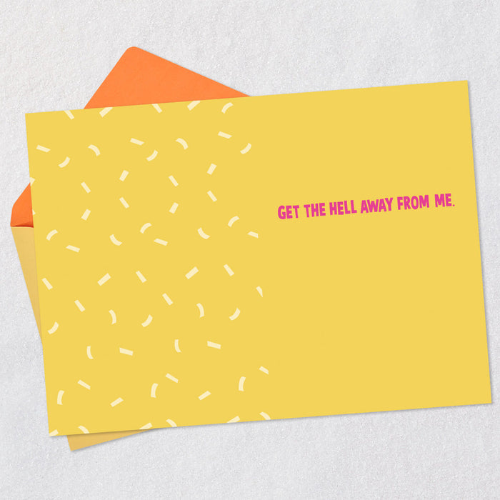 Yellow card with white pattern and pink text 'GET THE HELL AWAY FROM ME' on a light gray background