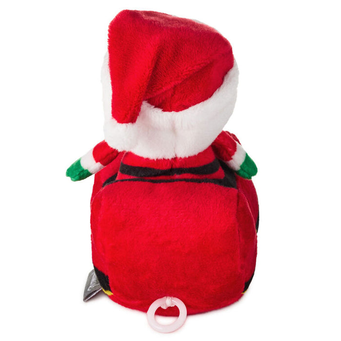 Red plush toy with a Santa hat on a white background